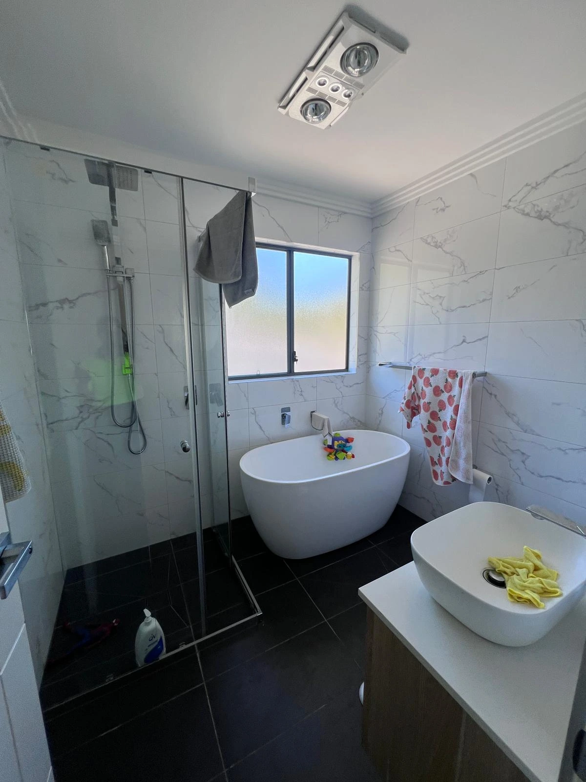 Bathroom deep cleaned after move out with sanitised shower sink and toilet in Sydney property